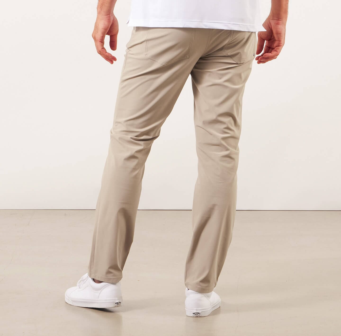 model showing back of the Around The Clock Pants in khaki