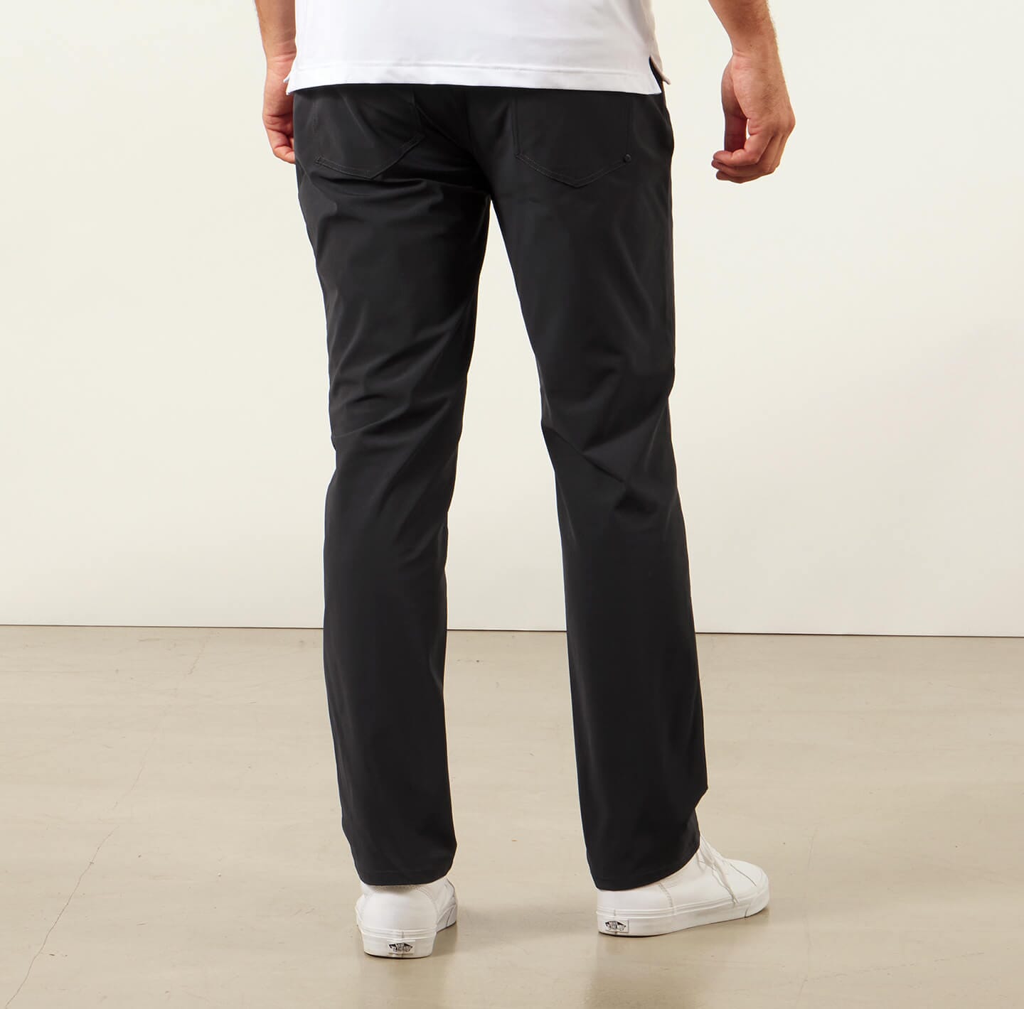 model showing back of the black Around The Clock Pants in Black