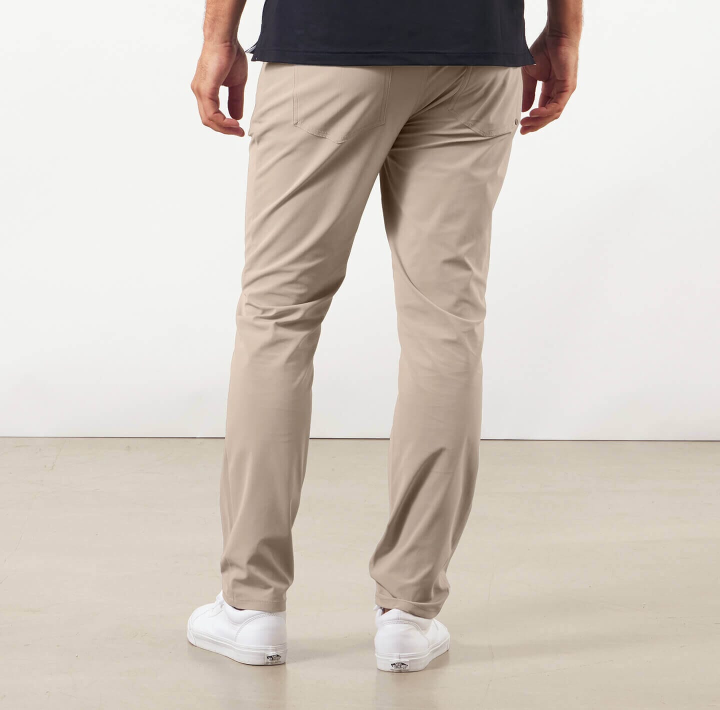 model showing back of the Around The Clock Pants in Khaki