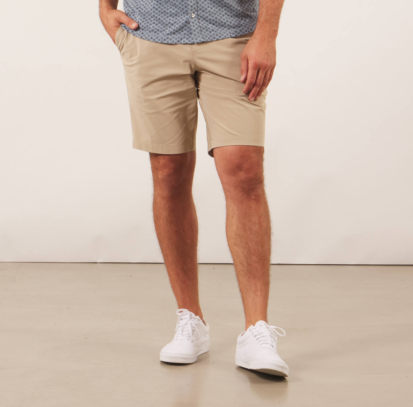 model showing the Around The Clock khaki shorts from the front