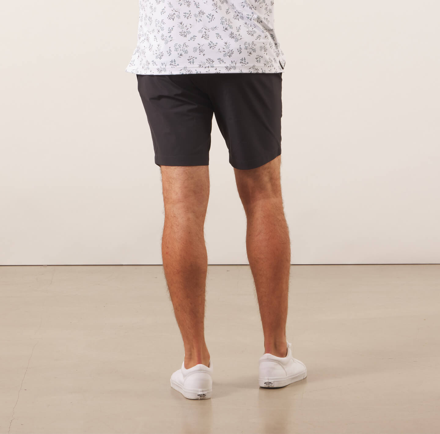 model showing the Around The Clock black shorts from the back